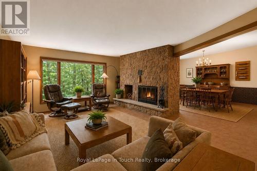 Digitally Staged/Enhanced - 54 Lackie Crescent, Tiny, ON - Indoor Photo Showing Living Room With Fireplace