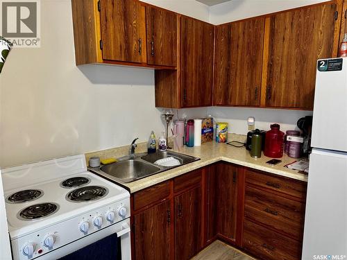 A & B 129 1St Avenue W, Margo, SK - Indoor Photo Showing Kitchen With Double Sink