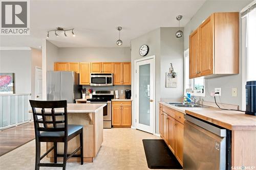 618 Deer Court, Warman, SK - Indoor Photo Showing Kitchen With Double Sink