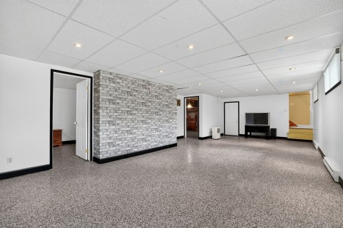 Salle familiale - 14 Rue Henri, Saint-Esprit, QC - Indoor Photo Showing Other Room