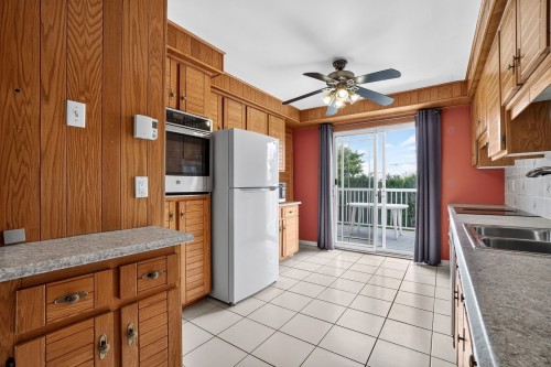 Cuisine - 14 Rue Henri, Saint-Esprit, QC - Indoor Photo Showing Kitchen With Double Sink