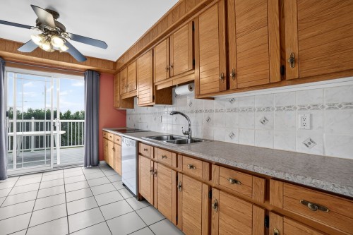 Cuisine - 14 Rue Henri, Saint-Esprit, QC - Indoor Photo Showing Kitchen With Double Sink