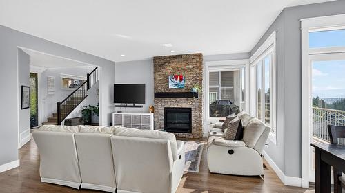 2425 Tallus Heights Drive, West Kelowna, BC - Indoor Photo Showing Living Room With Fireplace