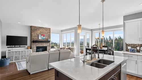2425 Tallus Heights Drive, West Kelowna, BC - Indoor Photo Showing Kitchen With Fireplace With Double Sink