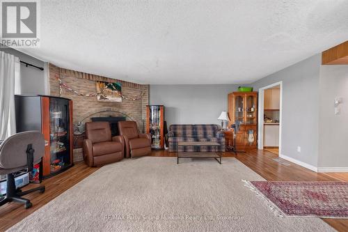Digitally edited to remove clutter - 3E - 20 Ryder Drive, Mcdougall, ON - Indoor With Fireplace