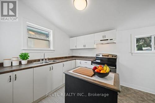 Kitchen - virtually staged - 7 Maple Street, St. Thomas, ON - Indoor Photo Showing Kitchen With Double Sink