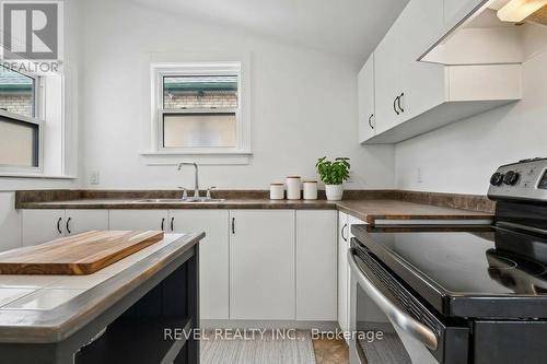 Kitchen - virtually staged - 7 Maple Street, St. Thomas, ON - Indoor Photo Showing Kitchen With Double Sink
