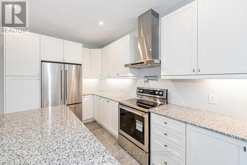49 Periwinkle Road, Springwater, ON - Indoor Photo Showing Kitchen With Stainless Steel Kitchen