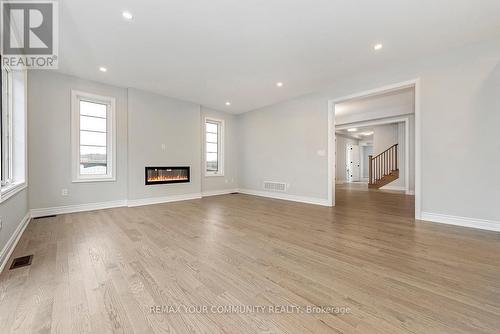 49 Periwinkle Road, Springwater, ON - Indoor Photo Showing Other Room With Fireplace