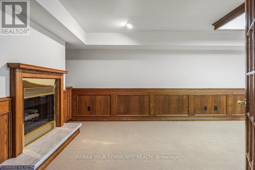 Lower - 27 Denham Drive, Richmond Hill, ON - Indoor Photo Showing Other Room With Fireplace