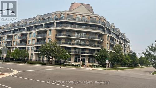 222 - 111 Civic Square Gate, Aurora, ON - Outdoor With Balcony With Facade