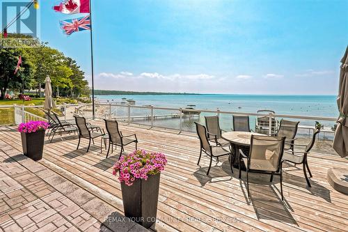 1834 Tiny Beaches Road S, Tiny, ON - Outdoor With Body Of Water With Deck Patio Veranda