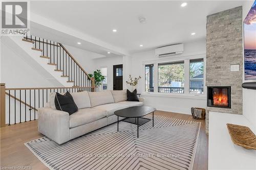 1379 Caroline Street, Burlington, ON - Indoor Photo Showing Living Room With Fireplace