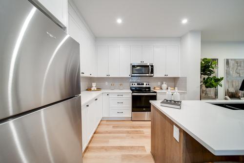 11121 62 Street, Edmonton, AB - Indoor Photo Showing Kitchen With Stainless Steel Kitchen With Double Sink With Upgraded Kitchen