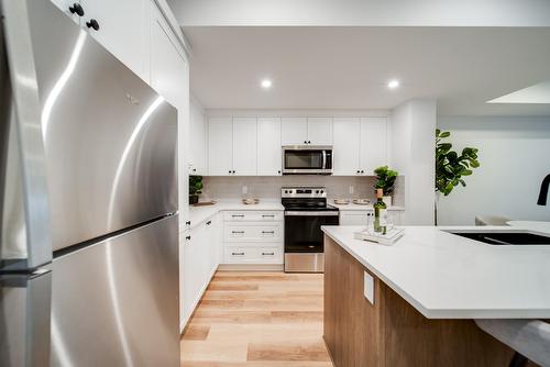 11121 62 Street, Edmonton, AB - Indoor Photo Showing Kitchen With Stainless Steel Kitchen With Double Sink With Upgraded Kitchen