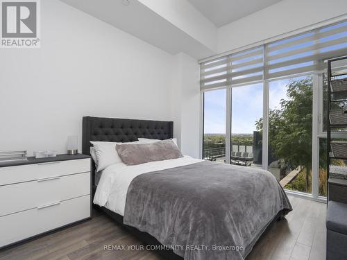 Floor to ceiling windows throughout - 1012 - 99 Eagle Rock Way, Vaughan, ON - Indoor Photo Showing Bedroom