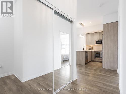 Oversized mirrored closets in entrance - 1012 - 99 Eagle Rock Way, Vaughan, ON - Indoor