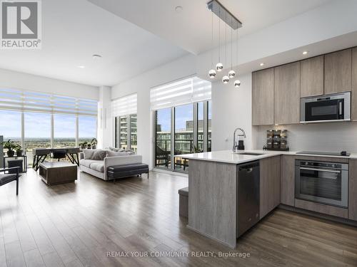 Bright Open concept corner unit - 1012 - 99 Eagle Rock Way, Vaughan, ON - Indoor Photo Showing Kitchen