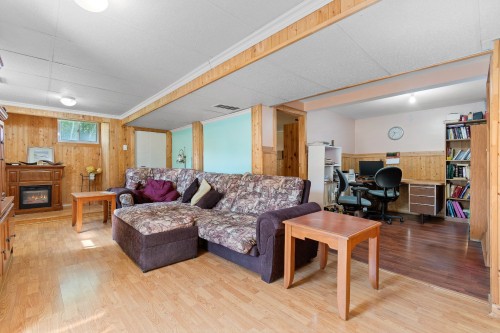 Salle familiale - 1064 Route 148, Litchfield, QC - Indoor Photo Showing Living Room With Fireplace