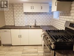 LOWER - 1133 DUFFERIN STREET Toronto, ON M6H 4B7