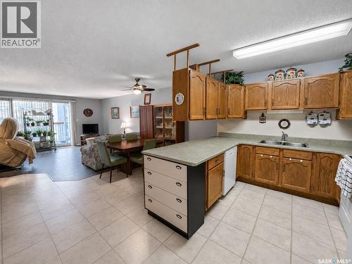 304 255 7Th Street E, Prince Albert, SK - Indoor Photo Showing Kitchen With Double Sink