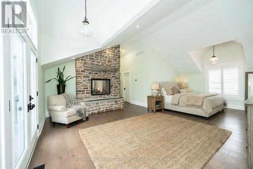 16 Heron Boulevard, Springwater, ON - Indoor Photo Showing Other Room With Fireplace