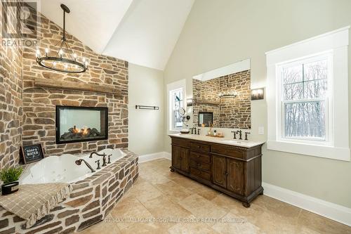 16 Heron Boulevard, Springwater, ON - Indoor Photo Showing Other Room With Fireplace