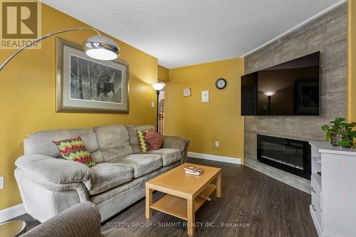 3176 Dovetail Mews, Mississauga, ON - Indoor Photo Showing Living Room With Fireplace