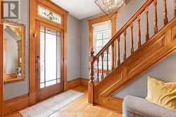 Impressive oak front door; stained glass transom - 