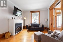 High ceilings & hardwood floors thru living spaces - 