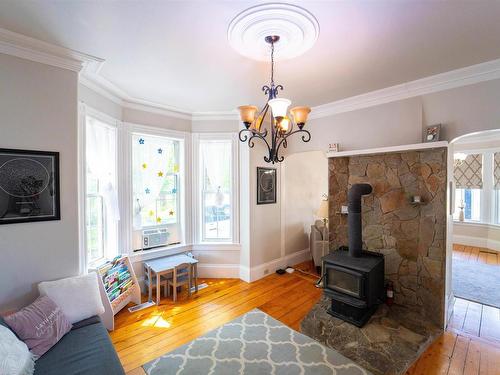 42 Victoria Street, Amherst, NS - Indoor Photo Showing Living Room With Fireplace