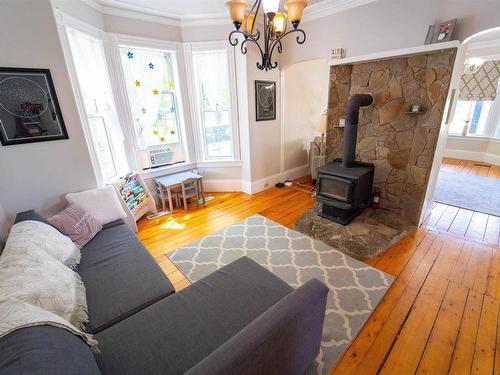 42 Victoria Street, Amherst, NS - Indoor Photo Showing Living Room With Fireplace