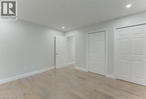 Interior room featuring light-toned wood-finish flooring and recessed ceiling lighting - 80 Lower Canada Crescent, Kitchener, ON - Indoor Photo Showing Other Room
