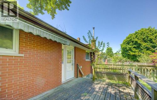 Spacious outdoor deck with a wooden railing system - 80 Lower Canada Crescent, Kitchener, ON - Outdoor With Deck Patio Veranda With Exterior