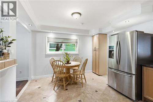 Kitchen featuring tile flooring with decorative accents, recessed lighting, and a stainless steel French door refrigerator - 432 Upper Sherman Avenue, Hamilton, ON - Indoor Photo Showing Dining Room