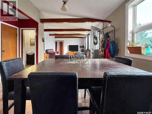 701 3Rd Avenue, Spy Hill, SK - Indoor Photo Showing Dining Room With Fireplace