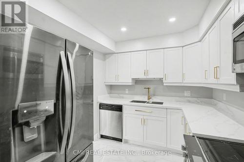 12 - 125 Sekura Crescent, Cambridge, ON - Indoor Photo Showing Kitchen With Double Sink