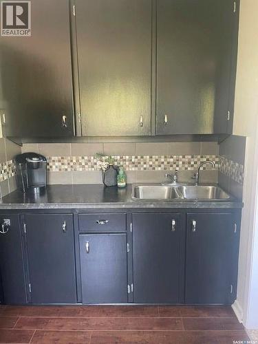 1408 6Th Avenue, Regina Beach, SK - Indoor Photo Showing Kitchen With Double Sink