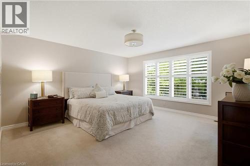 Expansive room with neutral wall tones and light-colored carpeting - 1090 Crofton Way, Burlington, ON - Indoor Photo Showing Bedroom