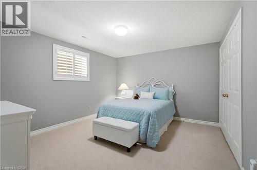 Bedroom featuring light gray walls, carpet flooring, and white baseboards - 1090 Crofton Way, Burlington, ON - Indoor Photo Showing Bedroom