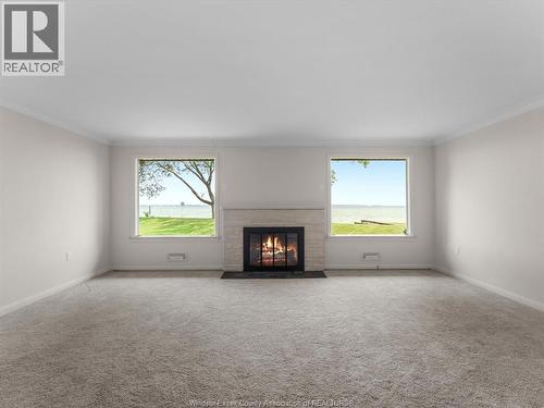 11506 Riverside, Windsor, ON - Indoor Photo Showing Living Room With Fireplace