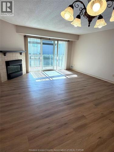 1995 Normandy Unit# 301, Lasalle, ON - Indoor With Fireplace