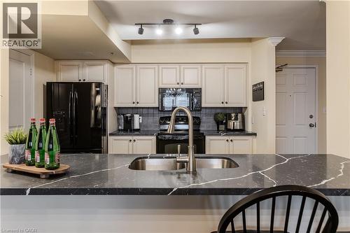 391 Plains Road E Unit# 412, Burlington, ON - Indoor Photo Showing Kitchen With Double Sink