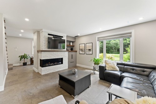 Living Room - 145 Ch. Léger, Brigham, QC - Indoor Photo Showing Living Room With Fireplace