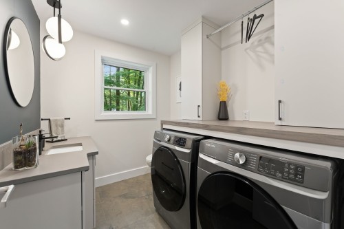 Powder room - 145 Ch. Léger, Brigham, QC - Indoor Photo Showing Laundry Room