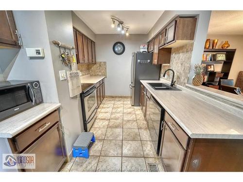 1277 Cardinal Crescent, Tecumseh, ON - Indoor Photo Showing Kitchen With Double Sink