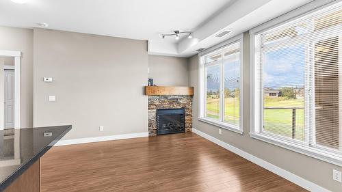 212-3533 Carrington Road, West Kelowna, BC - Indoor Photo Showing Living Room With Fireplace