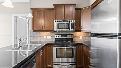 212-3533 Carrington Road, West Kelowna, BC - Indoor Photo Showing Kitchen With Double Sink With Upgraded Kitchen