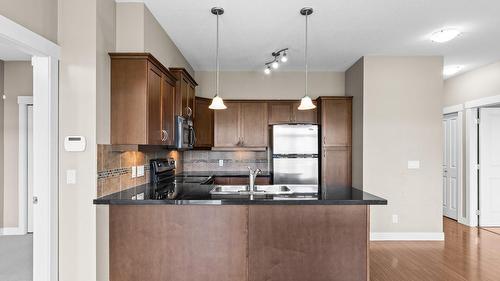 212-3533 Carrington Road, West Kelowna, BC - Indoor Photo Showing Kitchen With Double Sink