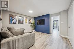 Spacious interior with light wood-finish flooring - 